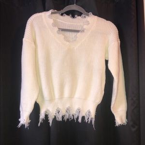 Distressed sweater
